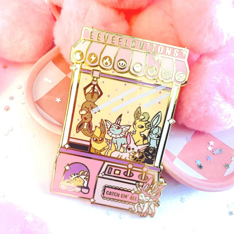 Eeveelution claw machine enamel pin