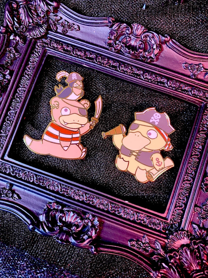 Pirate Slowpoke and Psyduck Enamel Pins