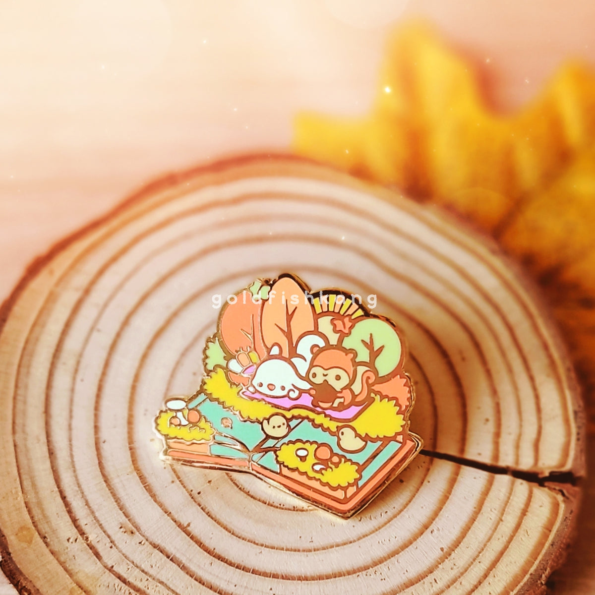 Story of Autumn Enamel Pin: Cosy Riverside Picnic