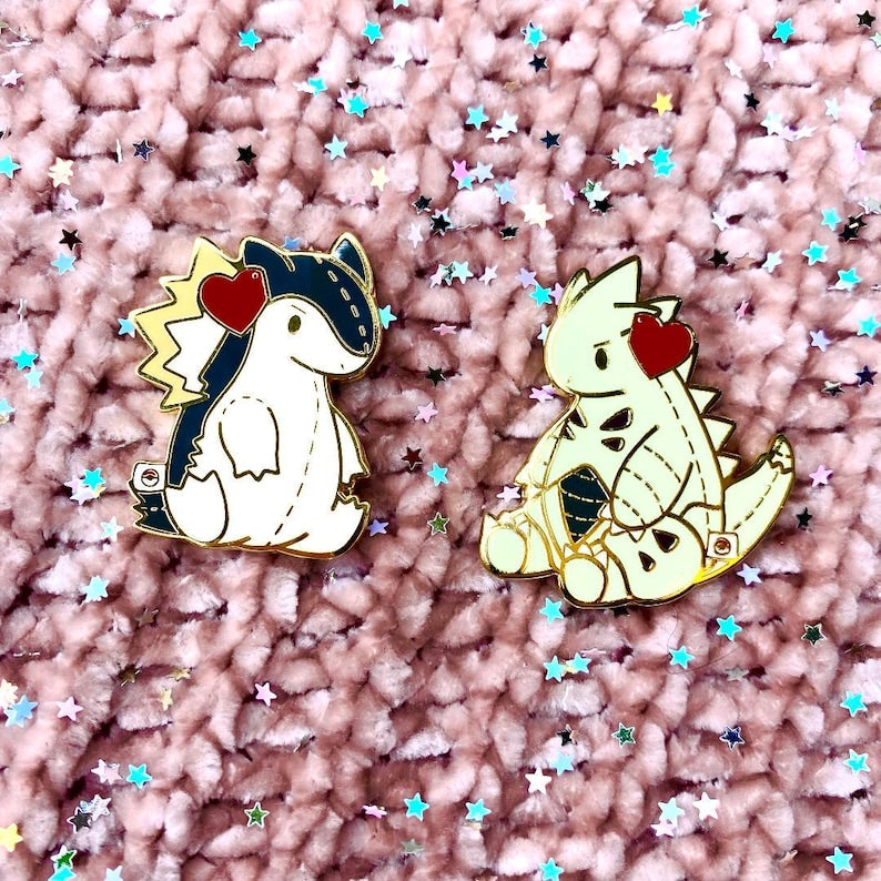 Plushie Tyranitar and Typhlosian Enamel Pin